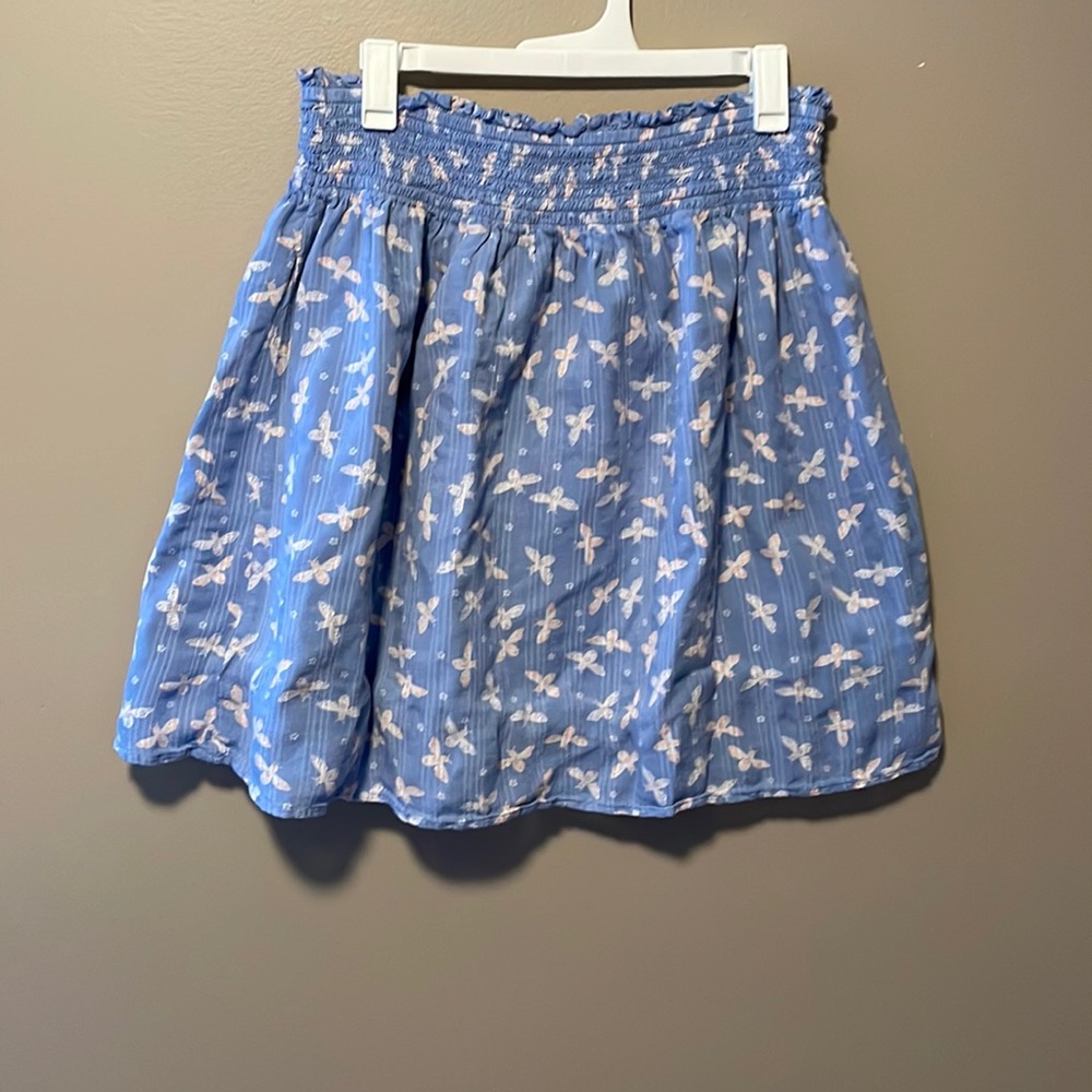 Blue elastic waist loft skirt above knee